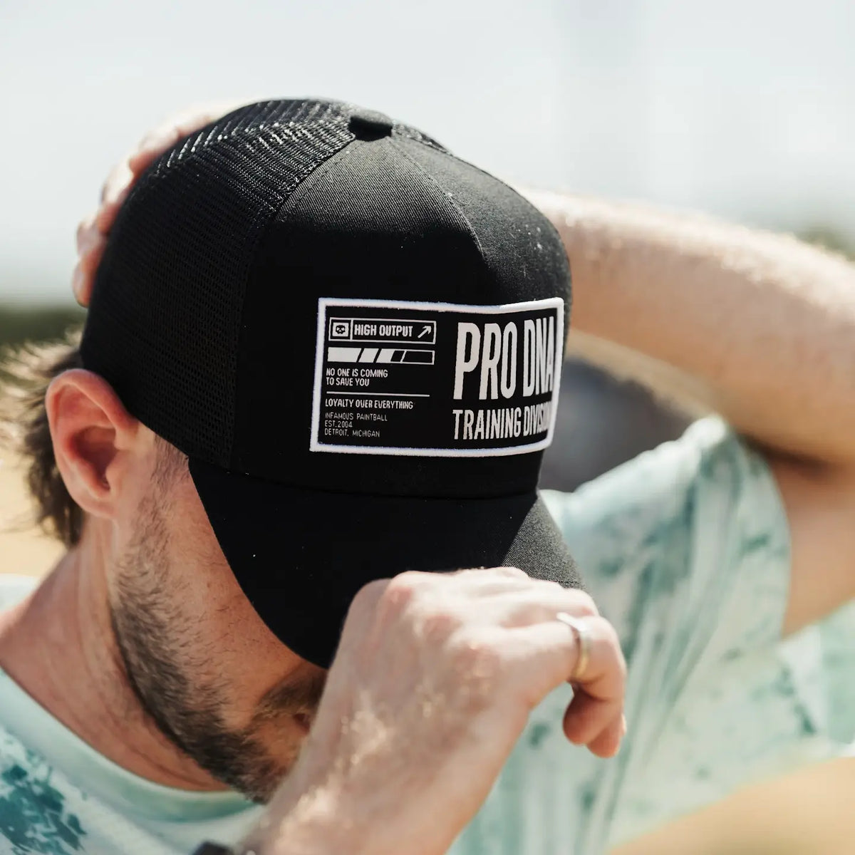 INFAMOUS™ Snapback Trucker Hat - Training Division - Black Infamous Paintball