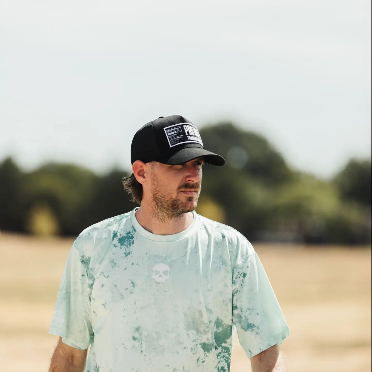 INFAMOUS™ Snapback Trucker Hat - Training Division - Black Infamous Paintball
